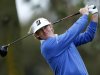 U.S. golfer Brandt Snedeker hits a drives off the 11th tee of the south course at Torrey Pines during first round play at the Farmers Insurance Open in San Diego
