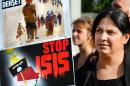 A woman in the Dutch city of Arnhem takes part in a protest against the Islamic State group in August 2014