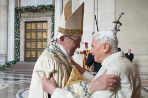 Pope Francis (left) greets Pope emeritus Benedict XVI …