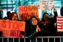 People protest against President Donald Trump's travel ban in New York