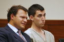 FILE- This Tuesday, Sept. 10, 2013, file photo shows Matthew Cordle, right, and his attorney, Martin Midian in court in Columbus, Ohio. Cordle, who confessed in an online video to causing a fatal wrong-way crash after a night of heavy drinking, will plead guilty to the crime on Wednesday, Sept 18, 2013, according to his attorneys. (AP Photo/Mike Munden, File)