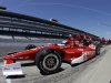 In this photo taken with a fisheye lens, Scott Dixon, of New Zealand, pulls out of the pit area during practice for the Indianapolis 500 auto race at the Indianapolis Motor Speedway in Indianapolis, Monday, May 13, 2013. (AP Photo/Darron Cummings)