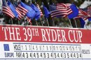 Flags fly on the main scoreboard during a practice round at the 39th Ryder Cup golf matches at the Medinah Country Club in Medinah