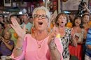 Food Network television personality Deen cheers for her husband during the semi-finals of the "Papa" Hemingway Look-Alike Contest at Sloppy Joe's Bar in Key West