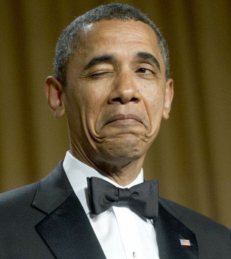 US President Barack Obama winks as he tells a joke about his place of birth during the White House Correspondents Association Dinner in Washington, DC, April 28, 2012. The annual event, which brings t