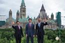 Mexican President Enrique Pena Nieto (L), Canadian Prime Minister Justin Trudeau and US President Barack Obama (R) pose during the North American Leaders Summit on June 29, 2016 in Ottawa, Ontario
