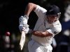 New Zealand's Rutherford hits a shot during the second day of their first test against England at the University Oval in Dunedin