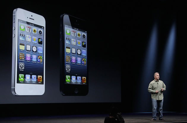 Phil Schiller, Apple's senior vice president of worldwide marketing, unveils the iPhone 5 (AP)