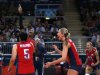 Hooker celebrates with her team mates Miyashiro, Larson and Harmotto after winning their women's semi-final volleyball match against South Korea at Earls Court during the London 2012 Olympic Games