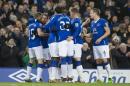 Everton's Aaron Lennon, second left, celebrates with teammates after scoring during the English Premier League soccer match between Everton and Newcastle at Goodison Park Stadium, Liverpool, England, Wednesday Feb. 3, 2016. (AP Photo/Jon Super)