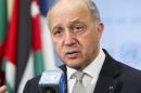 In this March 27, 2015, photo provided by the United Nations, Laurent Fabius, Minister of Foreign Affairs of France, speaks with the media at United Nations headquarters. Fabius said Friday his country will propose a U.N. Security Council resolution in the coming weeks that could present a framework for negotiations toward resolving the Israeli-Palestinian conflict. (AP Photo/United Nations, Rick Bajornas)