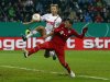 Munich's Schweinsteiger attempt to score against Augsburg during their German DFB Cup (DFB Pokal) round of sixteen soccer match in Augsburg