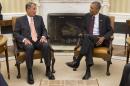 President Barack Obama talks with House Speaker John Boehner of Ohio in the Oval Office of the White House in Washington, Tuesday, Sept. 9, 2014. The president met with Congressional leaders to discuss options for combating the Islamic State. (AP Photo/Evan Vucci)