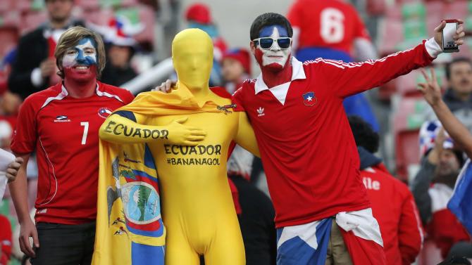 Chile and Ecuador fans celebrate before the opening soccer match in the Copa America Chile 2015 at National Stadium in Santiago