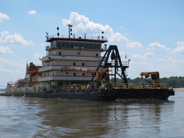 The 350-foot U.S. Army Corps of Engineers' Dredge Hurley works to clear a navigation channel on the Mississippi River on Monday, Aug. 20, 2012 near Memphis, Tenn. (AP Photo/Adrian Sainz)