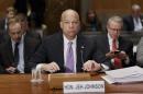 Homeland Security Secretary Jeh Johnson prepares to testify on Capitol Hill in Washington, Thursday, March 13, 2014, to outline President Barack Obama's FY2015 budget requests to the Senate Homeland Security and Governmental Affairs Committee. (AP Photo/J. Scott Applewhite)
