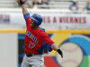 Dominican Republic's Nelson Cruz celebrates after hitting an RBI single off Spain starting pitcher Yoanner Negrin in the second inning of a World Baseball Classic game in San Juan, Puerto Rico, Saturday, March 9, 2013. (AP Photo/Andres Leighton)