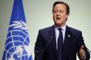 Britain's Prime Minister Cameron delivers a speech during the opening session of the World Climate Change Conference 2015 (COP21) at Le Bourget
