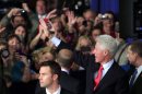 Former President Bill Clinton waves as he leaves following a campaign stop for President Barack Obama at the University of New Hampshire, Wednesday, Oct. 3, 2012 in Durham, NH (AP Photo/Jim Cole)