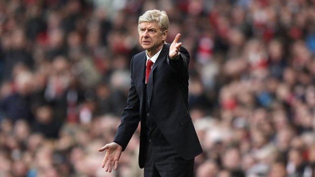 Arsene Wenger watches Arsenal's 2-1 win over Liverpool (PA Photos)