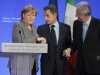 German Chancellor Angela Merkel, left, France's President Nicolas Sarkozy, center, and Italy's Prime Minister Mario Monti,  shake hands at the end of a press conference in Strasbourg, eastern France, Thursday, Nov 24, 2011.  The leaders of Germany, France and Italy are set for debate on the European Central Bank's role in the region's debt crisis and on how to align eurozone economic policies. (AP Photo/Michel Euler, Pool)