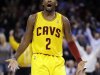 Cleveland Cavaliers' Kyrie Irving celebrates after making a 3-pointer against the Los Angeles Lakers in the second quarter of an NBA basketball game, Tuesday, Dec. 11, 2012, in Cleveland. (AP Photo/Mark Duncan)