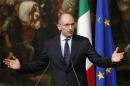 Italian Prime Minister Enrico Letta gestures during a news conference at Chigi Palace in Rome