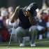 USA's Tiger Woods pauses on the 11th green during a four-ball match at the Ryder Cup PGA golf tournament Saturday, Sept. 29, 2012, at the Medinah Country Club in Medinah, Ill. (AP Photo/David J. Phillip)