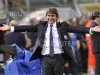 Juventus' coach Conte celebrates after winning the Italian Serie A title at the end of the match against Cagliari in Trieste