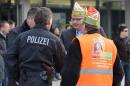 Carnival parade organizers and police discuss in Braunschweig, Germany, Sunday, Feb. 15, 2015. Police in Braunschweig cancelled a popular carnival street parade because of fears of an imminent Islamist terror attack. Police spokesman Thomas Geese said police received credible information that there was a 
