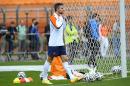 Netherlands's Robin van Persie arrives for a training session one day before their World Cup semifinal soccer match against Argentina at the Paulo Machado de Carvalho Stadium in Sao Paulo, Brazil, Tuesday, July 8, 2014. (AP Photo/Manu Fernandez)