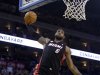 Miami Heat's LeBron James (6) dunks against the Golden State Warriors during the first half of an NBA basketball game in Oakland, Calif., Wednesday, Jan. 16, 2013. James on Wednesday became the youngest player in NBA history to score 20,000 points. (AP Photo/Marcio Jose Sanchez)