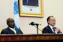 Ugandan President Yoweri Museveni (L) and World Bank President Jim Yong Kim (R) are pictured during a press conference at the State house in Entebbe, Uganda on May 24, 2013