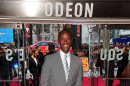 Don Cheadle doesn't mind having a few 'battle scars' from film stunts