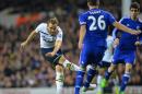 Tottenham Hotspur's English striker Harry Kane shoots to score during an English Premier League football match against Chelsea at White Hart Lane in London on January 1, 2015