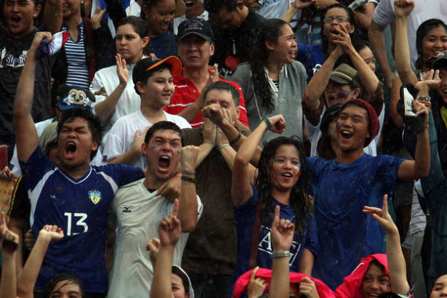 Pinoy fans show a variety of emotions during a football game in Manila. (File Photo by Marlo Cueto, NPPA Images)