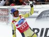 World Cup overall points leader Aksel Lund Svindal of Norway celebrates after crossing the finish line to win in the men's World Cup Super-G race in Val Gardena