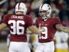 Stanford kicker Jordan Williamson (19) celebrates with teammate Daniel Zychlinski (36) after making a 46-yard field goal against San Jose State during the first half of an NCAA college football game in Stanford, Calif., Friday, Aug.  31, 2012. (AP Photo/Marcio Jose Sanchez)
