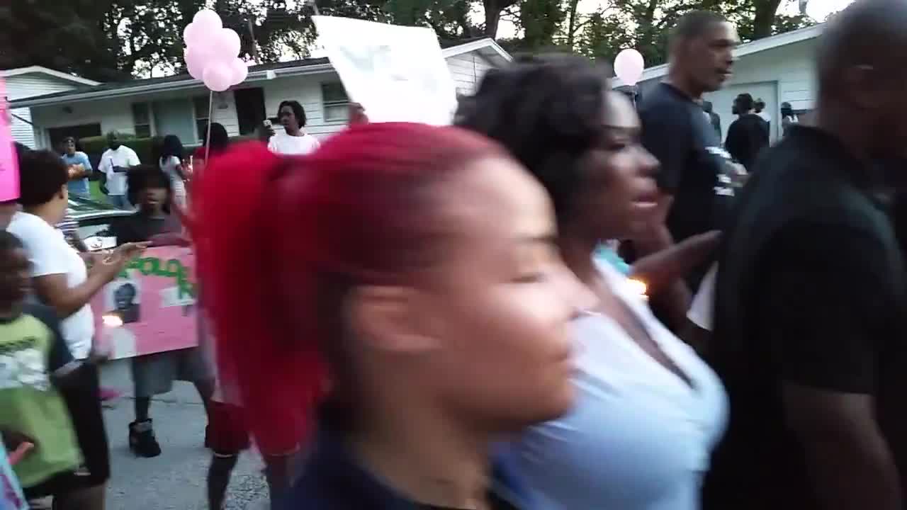 Ferguson Residents Hold Vigil for Girl, 9, Fatally Shot at Home