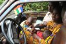Residents of the city of Damara, 75 km north of Bangui, leave the region for Bangui on December 3, 2013