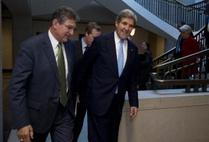 Secretary of State John Kerry walks with Senate Banking …