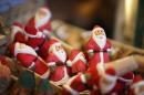 Santa Claus wine stoppers are offered for sale at Christkindlmarket Chicago on December 4, 2013 in Chicago, Illinois
