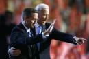 Attorney General Beau and Vice Presidential candidate Senator Biden gesture on stage at the 2008 Democratic National Convention in Denver