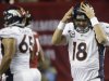 Denver Broncos quarterback Peyton Manning (18) reacts after being sacked by the Atlanta Falcons during the first half of an NFL football game, Monday, Sept. 17, 2012, in Atlanta. (AP Photo/John Bazemore)
