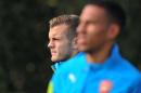 Arsenal's English midfielder Jack Wilshere (L) takes part in a team training session on September 30, 2014, at the Colney training ground