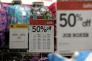 In this Thursday, Nov. 28, 2013, photo, sale signs are displayed at a Kmart, in New York. Sales are up 2 percent through Sunday, Dec. 15, 2013, according to data obtained by The Associated Press from store data tracker ShopperTrak, on Wednesday, Dec. 18, 2013, which declined to give dollar figures. The modest growth so far comes as the amount of discounting stores are doing is up 13 percent from last year, the highest level its been since 2008 when stores were holding huge sales events to draw in recession-weary shoppers, according to research firm BMO Capital Markets. (AP Photo/Julio Cortez)