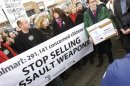 Protesters gather to deliver a petition to Walmart during an anti-gun protest in Danbury, Connecticut