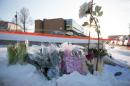 Flowers at a makeshift memorial near the Islamic Cultural Center in Quebec City, Canada on January 30, 2017