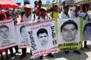 Parents and relatives of the 43 students from Ayotzinapa participate in a protest in Acapulco, Guerrero State, Mexico on March 24, 2015 demanding justice on their disappearance