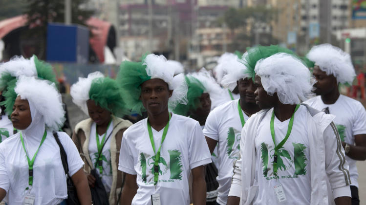 Nigeria soccer fans make their way to the stadium to watch the World Cup group F match between Argentina and Nigeria, in Porto Alegre, Brazil, Wednesday, June 25, 2014. (AP Photo/Dario Lopez-Mills)